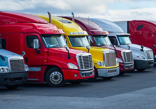 Row of semi-trucks.